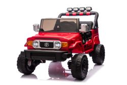 Elektrisches Kinderauto Toyota FJ Cruiser XXL mit 4x4 Antrieb, lizenziert (Zweisitzer), rot, Tragbare Lithiumbatterie, Hohes Fahrgestell, Zwei Sitze, Hinterradfederung, 2,4 GHz Fernbedienung, MP3-Player mit Bluetooth, LED-Lichter