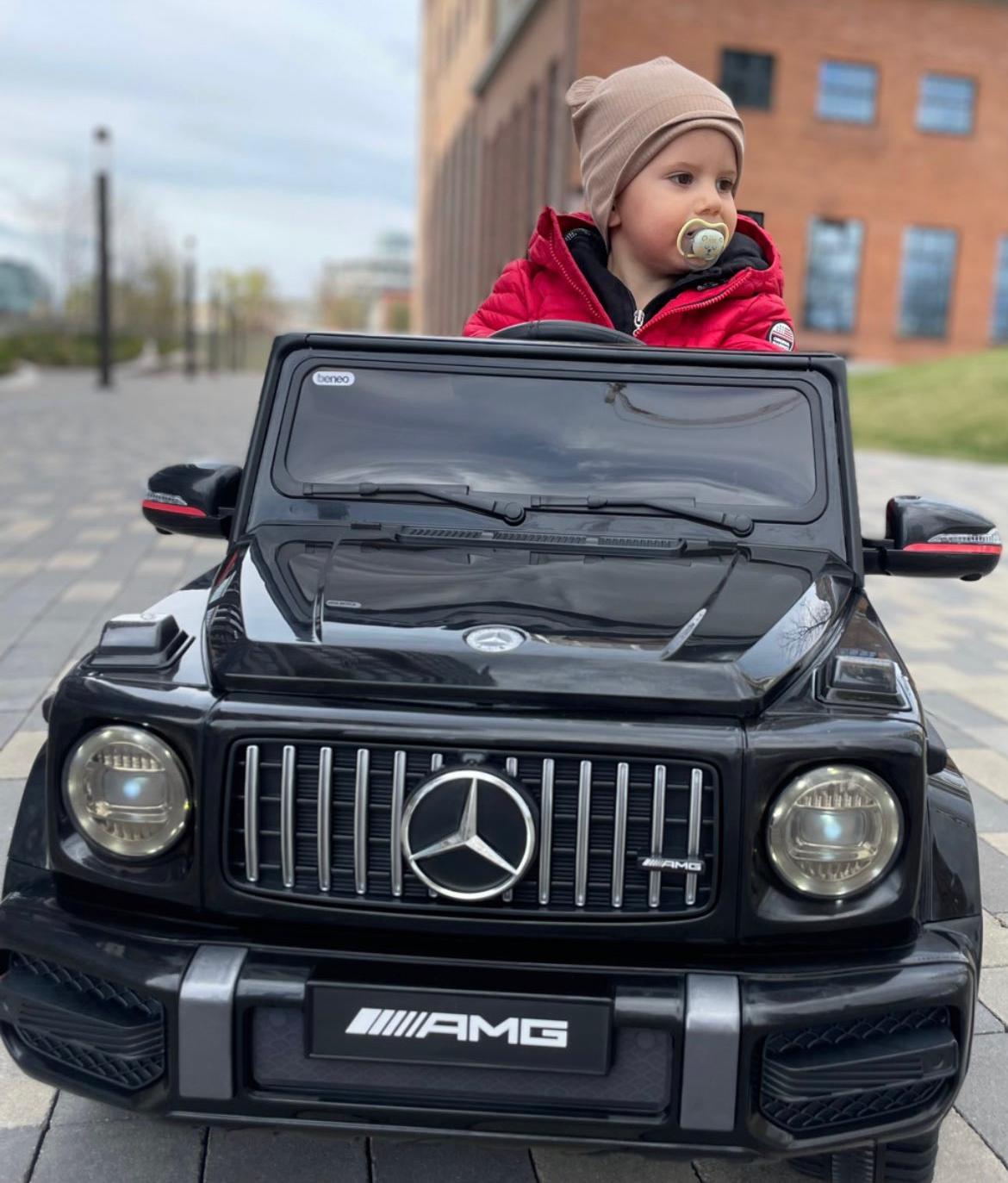 Kinder elektroauto 12V Mercedes G classe Neu Schwarz Originallizenz Batteriebetrieben Turen offnen Einzelsitz 2x Motor 12 V Batterie 2 4 GHz